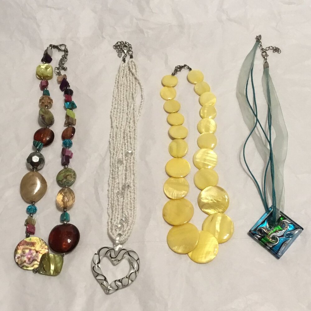 Fantastic lot of 4 colorful glass beach wearing necklaces
